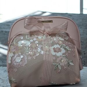 Vince Camuto Sequin Floral Bow Cosmetic Bag – Blush Pink